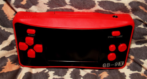 Console top view, showing AV/headphone jack